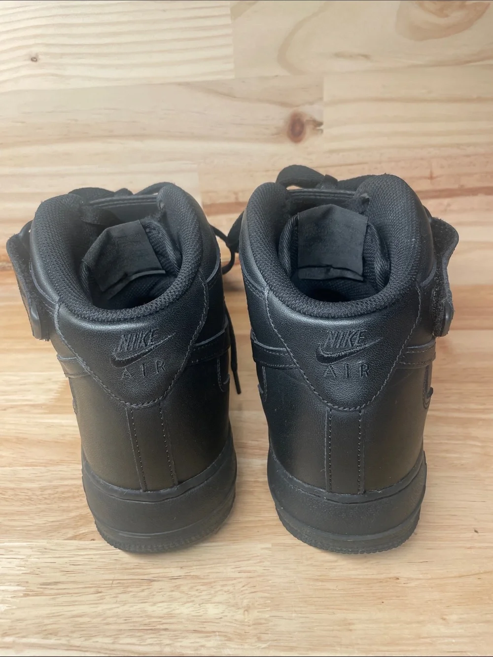 Nike Men’s Air Force 1 Black High-Top Leather Sneakers